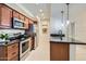 Open kitchen with stainless steel appliances and ample granite countertop space at 8653 E Royal Palm Rd # 1030, Scottsdale, AZ 85258