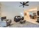Inviting living room with neutral colors, comfortable seating, and wood flooring at 8653 E Royal Palm Rd # 1030, Scottsdale, AZ 85258
