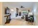 Cozy living room featuring fireplace, modern decor, and sliding door to patio at 8653 E Royal Palm Rd # 1030, Scottsdale, AZ 85258