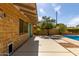 Backyard view showing the home's architectural elements, pool, and patio area at 8738 E Vista Dr, Scottsdale, AZ 85250