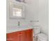 Cozy bathroom showcasing updated vanity, mirror, lighting, and toilet at 8738 E Vista Dr, Scottsdale, AZ 85250