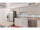 Functional kitchen featuring stainless steel appliances, light cabinets, and a classic design at 8738 E Vista Dr, Scottsdale, AZ 85250