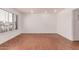 Bright living room with hardwood floors and white walls, offering a clean and modern feel at 8738 E Vista Dr, Scottsdale, AZ 85250