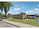 Charming single-story home with well-maintained lawn and covered parking at 921 S Hacienda Dr, Tempe, AZ 85281