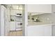 Functional kitchen with white appliances, ample cabinet space, and a pass-through counter at 921 S Hacienda Dr, Tempe, AZ 85281