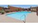 Community pool area featuring a sparkling blue pool with secure fencing at 921 S Hacienda Dr, Tempe, AZ 85281