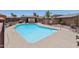 Community pool showcasing a sparkling pool with fence and seating areas at 921 S Hacienda Dr, Tempe, AZ 85281