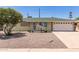 Charming single-story home featuring low-maintenance desert landscaping and a one-car garage at 1308 N 66Th St, Scottsdale, AZ 85257