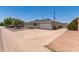 Charming single-story home featuring low-maintenance desert landscaping and a one-car garage at 1308 N 66Th St, Scottsdale, AZ 85257