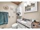 Bathroom featuring granite countertops and white cabinetry at 13428 N Hawthorn Dr, Sun City, AZ 85351