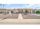 Inviting single-story home featuring a well-kept front yard and desert landscaping at 13428 N Hawthorn Dr, Sun City, AZ 85351