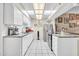 Spacious kitchen with ample counter space and bright lighting, perfect for cooking at 13428 N Hawthorn Dr, Sun City, AZ 85351
