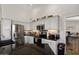 Modern kitchen featuring stainless steel appliances, granite countertops, and ample cabinet space at 14835 N 41St Pl, Phoenix, AZ 85032