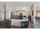Bright kitchen with stainless steel appliances, granite counters, and a breakfast bar for casual dining at 14835 N 41St Pl, Phoenix, AZ 85032