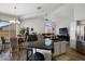 Bright open-concept living room and kitchen with modern finishes and ample natural light at 14835 N 41St Pl, Phoenix, AZ 85032