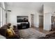 Comfortable living room with a plush sofa and a media center, perfect for relaxing and entertaining at 14835 N 41St Pl, Phoenix, AZ 85032