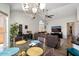 Bright open-concept living and dining area with modern finishes, and ample natural light at 14835 N 41St Pl, Phoenix, AZ 85032