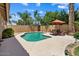 Pool and patio area featuring a dining table at 14835 N 41St Pl, Phoenix, AZ 85032