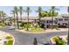 Stunning aerial view of gated community with palm trees and a refreshing swimming pool at 15221 N Clubgate Dr # 2139, Scottsdale, AZ 85254