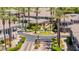Stunning aerial view of gated community with palm trees and a refreshing swimming pool at 15221 N Clubgate Dr # 2139, Scottsdale, AZ 85254