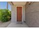 An inviting front door with a welcome mat and desert landscape at 15221 N Clubgate Dr # 2139, Scottsdale, AZ 85254