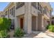 A charming front door with desert landscaping and a gas meter at 15221 N Clubgate Dr # 2139, Scottsdale, AZ 85254