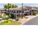 Condo building with desert landscaping and a convenient covered parking spot at 15221 N Clubgate Dr # 2139, Scottsdale, AZ 85254