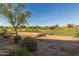 Beautiful desert landscape with golf course featuring sand traps and a manicured green at 15221 N Clubgate Dr # 2139, Scottsdale, AZ 85254