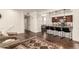 Open-concept layout showcasing the kitchen with breakfast bar and adjacent dining area at 15221 N Clubgate Dr # 2139, Scottsdale, AZ 85254