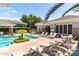 Community pool and lounge area with shaded seating, ideal for socializing and relaxation at 15221 N Clubgate Dr # 2139, Scottsdale, AZ 85254