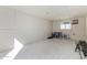 Spacious basement room featuring concrete flooring, clean drywall, and a single window at 1611 W Palomino Dr, Chandler, AZ 85224