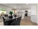 Charming dining area adjacent to the kitchen, perfect for Gathering meals and entertaining guests at 1611 W Palomino Dr, Chandler, AZ 85224