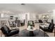 Spacious living area with an open floor plan, connecting the living room, dining area, and kitchen at 1611 W Palomino Dr, Chandler, AZ 85224