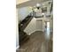 Grand foyer featuring a staircase, wood floors, and chandelier lighting at 16217 N 154Th Dr, Surprise, AZ 85374