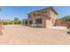 Home's exterior with a paver patio, sunroom, and well-maintained landscaping, ideal for outdoor enjoyment at 16217 N 154Th Dr, Surprise, AZ 85374