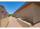 Side view of the exterior of the home, gravel landscaping at 17359 W Calistoga Dr, Surprise, AZ 85387