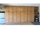 Spacious garage featuring ample built-in storage cabinets for organization at 17359 W Calistoga Dr, Surprise, AZ 85387