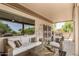 Relaxing covered patio with comfortable seating perfect for outdoor relaxation at 17359 W Calistoga Dr, Surprise, AZ 85387