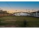 Expansive backyard with a privacy fence and lush green grass at 1818 W Highland Ave, Phoenix, AZ 85015