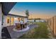 Enjoy outdoor dining on the brick-paved patio with manicured lawn at 1818 W Highland Ave, Phoenix, AZ 85015