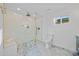 Sleek bathroom boasts a glass-enclosed shower and modern fixtures at 1818 W Highland Ave, Phoenix, AZ 85015