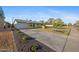 Charming single-story home with fresh landscaping and a spacious driveway at 1818 W Highland Ave, Phoenix, AZ 85015
