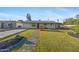 Charming home with a well-manicured lawn and inviting walkway at 1818 W Highland Ave, Phoenix, AZ 85015