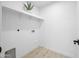 Bright laundry room has a clean and simple design at 1818 W Highland Ave, Phoenix, AZ 85015