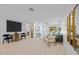 Spacious living room with modern furnishings, stylish decor, and ample natural light at 1818 W Highland Ave, Phoenix, AZ 85015