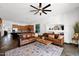 An open concept living room and kitchen offers ample room for entertaining and relaxing at 18455 W San Carlos Dr, Goodyear, AZ 85338