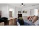 Serene main bedroom boasts wood floors, access to the bathroom, and soft, neutral tones at 18455 W San Carlos Dr, Goodyear, AZ 85338