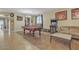 Spacious game room featuring a pool table, arcade game, and comfortable seating at 1923 N Cocoa Ct, Casa Grande, AZ 85122