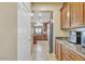Spacious kitchen featuring stainless steel appliances and ample cabinet space at 1923 N Cocoa Ct, Casa Grande, AZ 85122