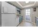 Functional kitchen layout with appliances included and adjacent breakfast nook at 1927 E Hampton Ave # 204, Mesa, AZ 85204